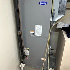 Broken-Drain-Line-on-a-Heat-Pump-Flooding-a-Laundry-Room-in-Johnson-City-TN 0
