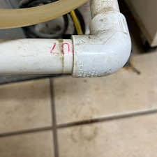 Broken-Drain-Line-on-a-Heat-Pump-Flooding-a-Laundry-Room-in-Johnson-City-TN 2