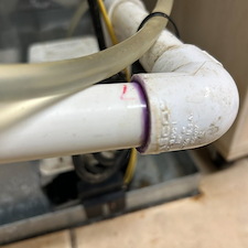 Broken-Drain-Line-on-a-Heat-Pump-Flooding-a-Laundry-Room-in-Johnson-City-TN 6
