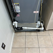 Broken-Drain-Line-on-a-Heat-Pump-Flooding-a-Laundry-Room-in-Johnson-City-TN 7