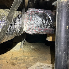 Rusted-Ductwork-in-a-Tight-Dirt-Covered-Crawl-Space-Gets-Swapped-Out-With-Our-HVAC-Duct-Service-in-Johnson-City-TN 15